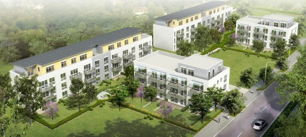 Rendered picture showing apartment buildings complex from Pixabay